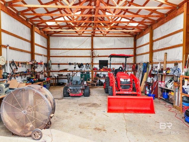 garage with a workshop area