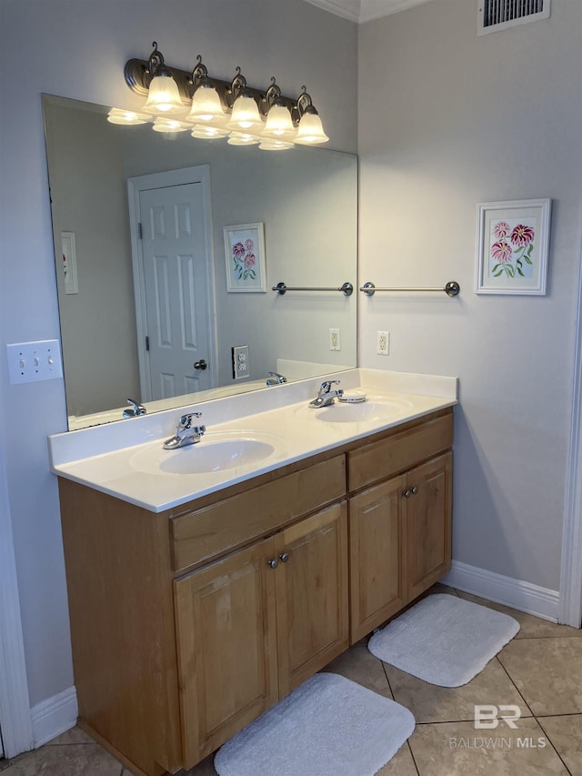 bathroom featuring tile patterned flooring and vanity