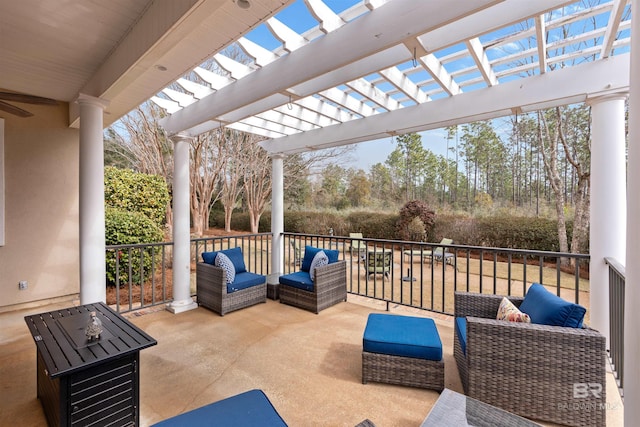 view of patio with an outdoor living space and a pergola