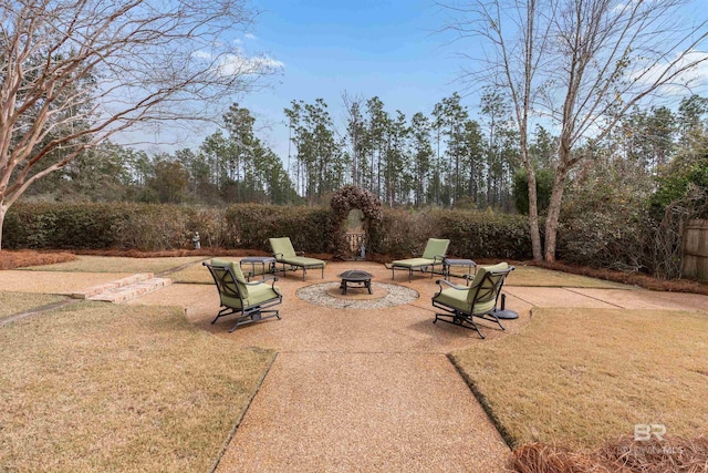 view of patio / terrace with a fire pit