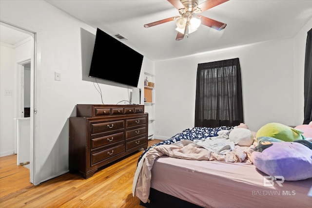 162 Westwood St, Mobile, AL 36606 - bedroom with light wood-type flooring and ceiling fan