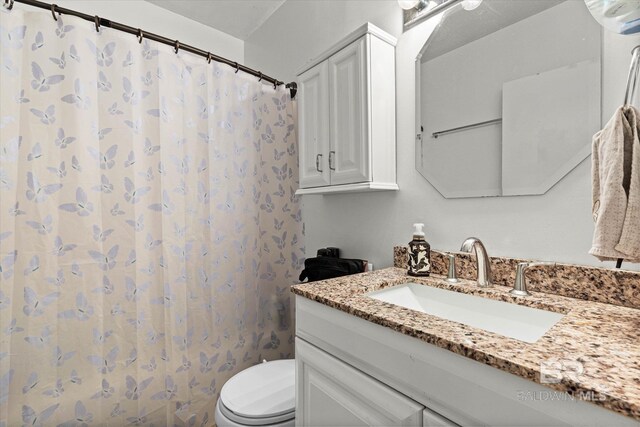 162 Westwood St, Mobile, AL 36606 - bathroom with vanity, toilet, and a shower with curtain