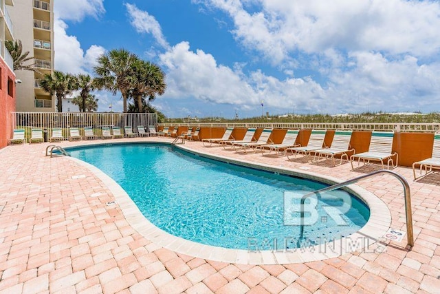 view of pool featuring a patio area