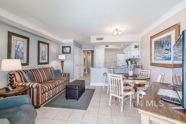 tiled living room featuring ornamental molding