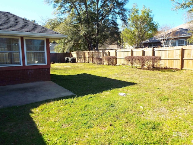 view of yard featuring a fenced backyard