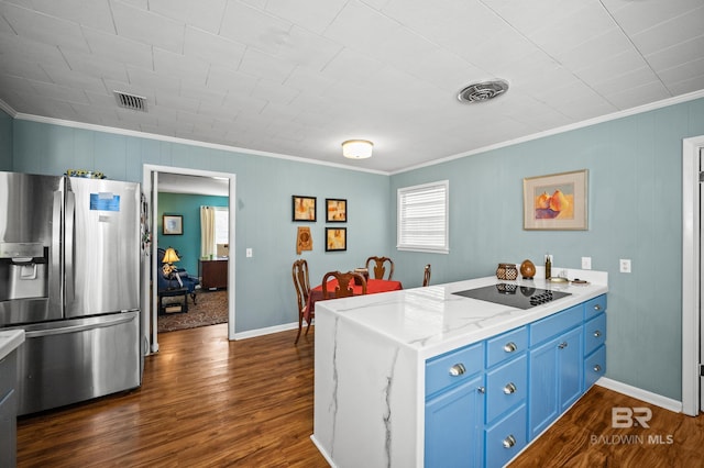56 Old Bratt Rd, Atmore, AL 36502 - kitchen featuring stainless steel fridge, crown molding, dark wood-style floors, a peninsula, and blue cabinets