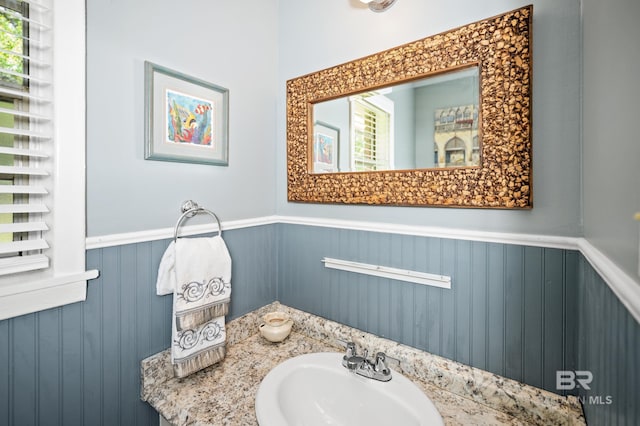 56 Old Bratt Rd, Atmore, AL 36502 - bathroom featuring wainscoting and vanity