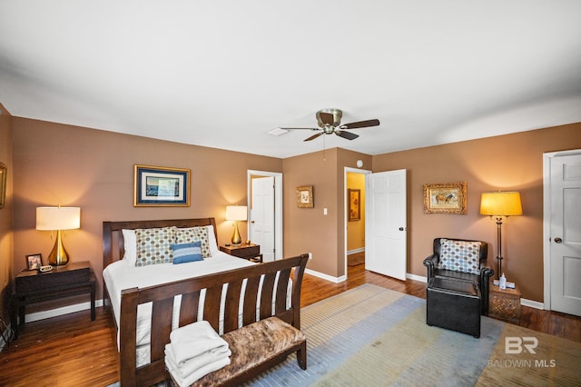 56 Old Bratt Rd, Atmore, AL 36502 - bedroom with baseboards, wood finished floors, and ceiling fan