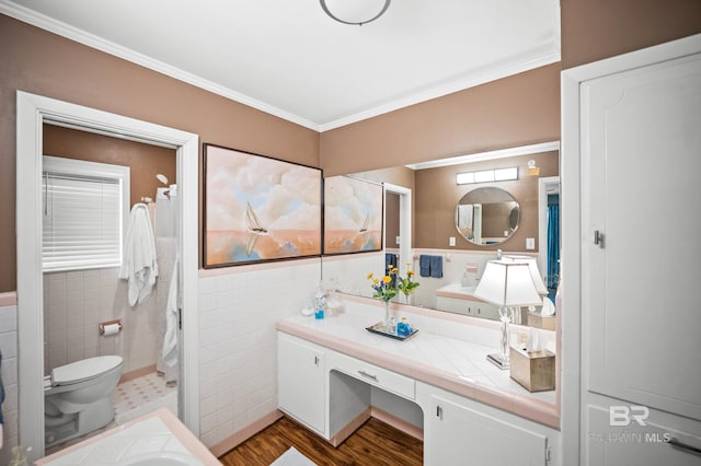 56 Old Bratt Rd, Atmore, AL 36502 - bathroom featuring tile walls, toilet, ornamental molding, vanity, and wood finished floors