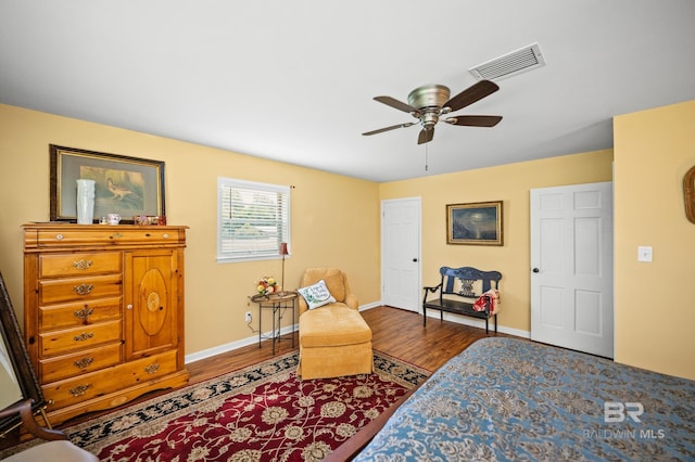 56 Old Bratt Rd, Atmore, AL 36502 - bedroom featuring wood finished floors, baseboards, and ceiling fan