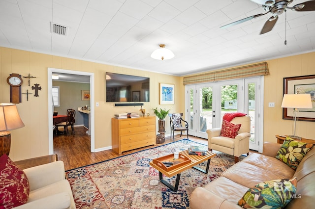 56 Old Bratt Rd, Atmore, AL 36502 - living area featuring crown molding, wood finished floors, a ceiling fan, and baseboards