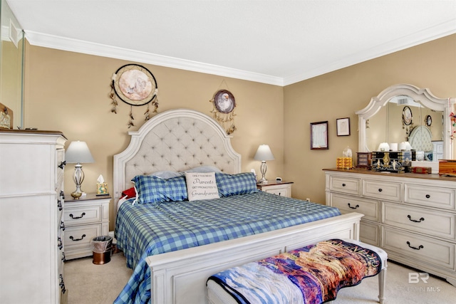 bedroom featuring crown molding and light carpet