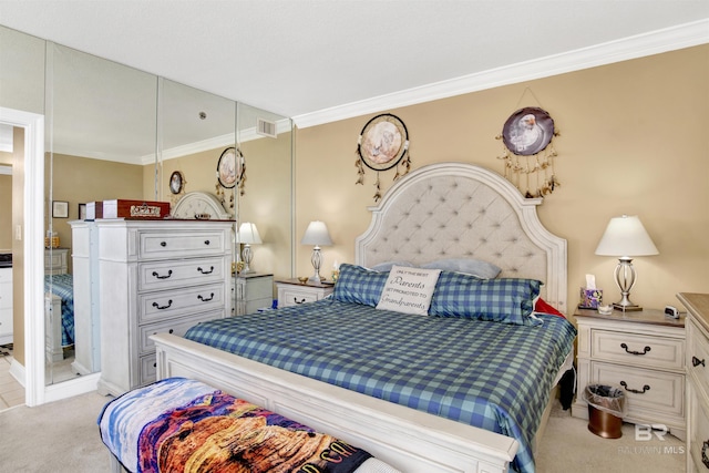 bedroom featuring crown molding, light colored carpet, and visible vents
