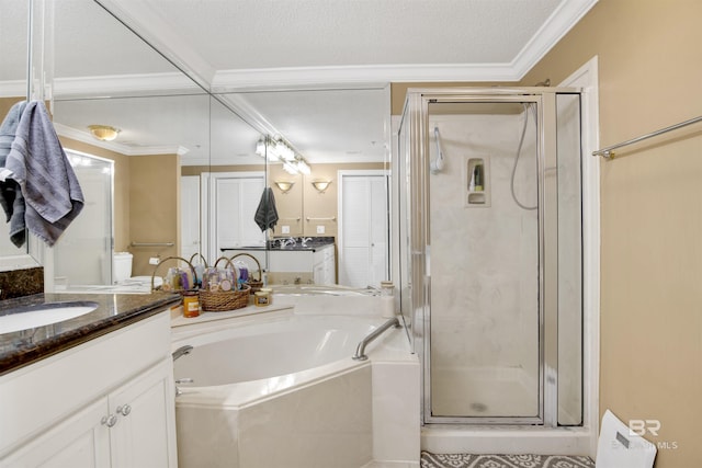 full bath featuring vanity, ornamental molding, a shower stall, and a bath
