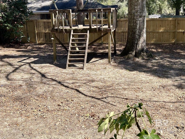 view of play area featuring fence