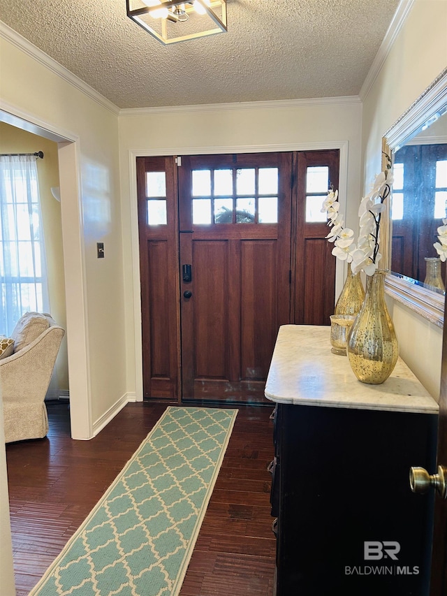 entryway with dark wood-style flooring, a wealth of natural light, and crown molding