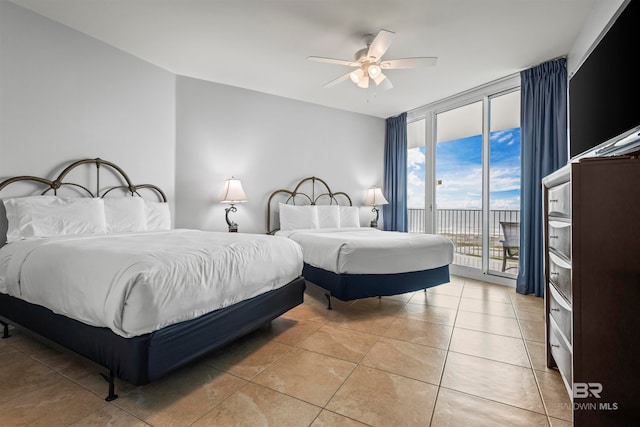 bedroom featuring access to outside, ceiling fan, and light tile patterned flooring