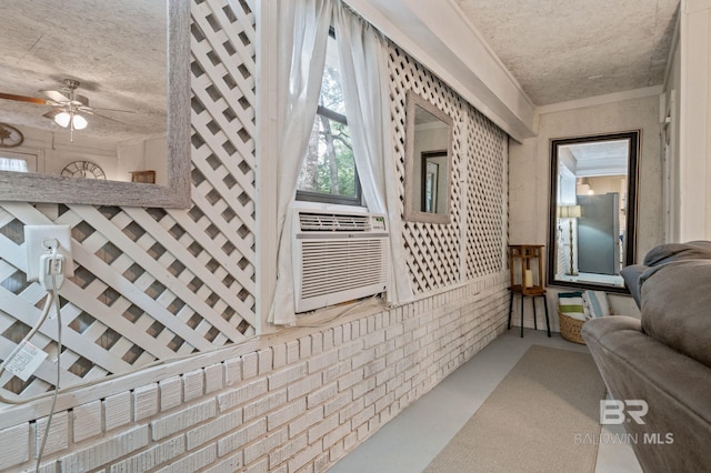 interior space featuring brick wall and finished concrete floors