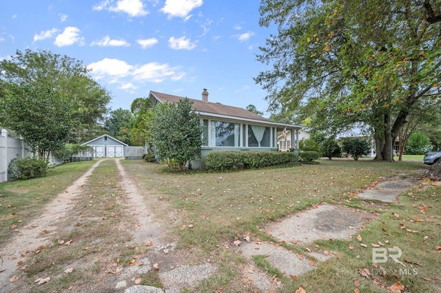 view of side of home featuring a lawn