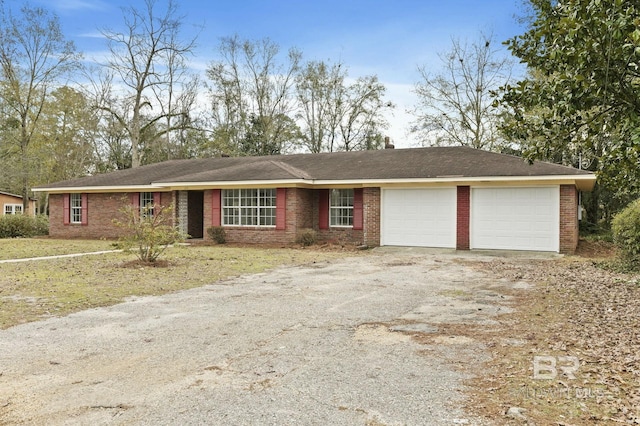 ranch-style house featuring a garage