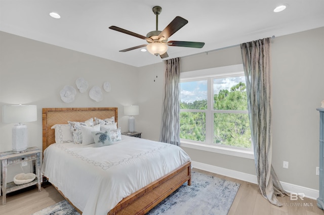 2831 Salt Dr, Orange Beach, AL 36561 - bedroom with baseboards, recessed lighting, light wood-style floors, and ceiling fan