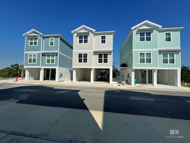 2831 Salt Dr, Orange Beach, AL 36561 - rear view of property featuring a carport