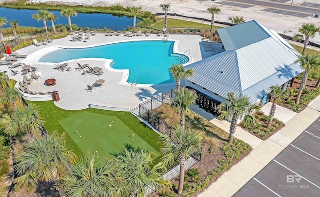 2831 Salt Dr, Orange Beach, AL 36561 - drone / aerial view of a pool area and a nearby body of water