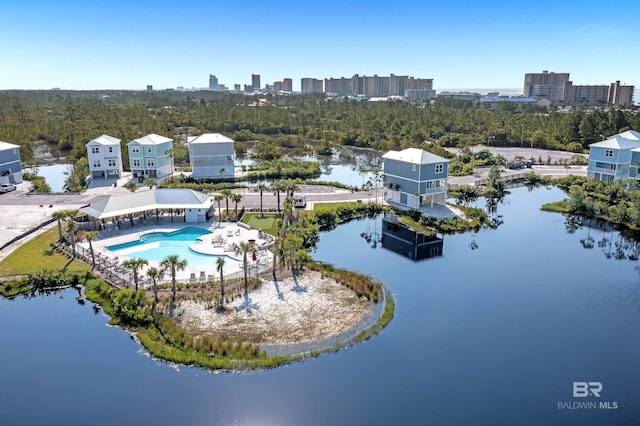 2831 Salt Dr, Orange Beach, AL 36561 - drone / aerial view of a pool, a nearby body of water, and skyline