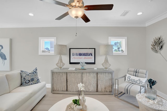 2831 Salt Dr, Orange Beach, AL 36561 - living room featuring ornamental molding, wood finished floors, a ceiling fan, recessed lighting, and baseboards