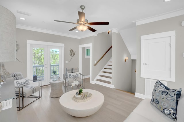 2831 Salt Dr, Orange Beach, AL 36561 - living area featuring light wood-type flooring, ceiling fan, stairs, baseboards, and recessed lighting