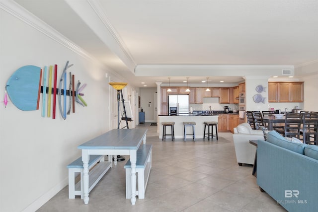 living room with sink and crown molding