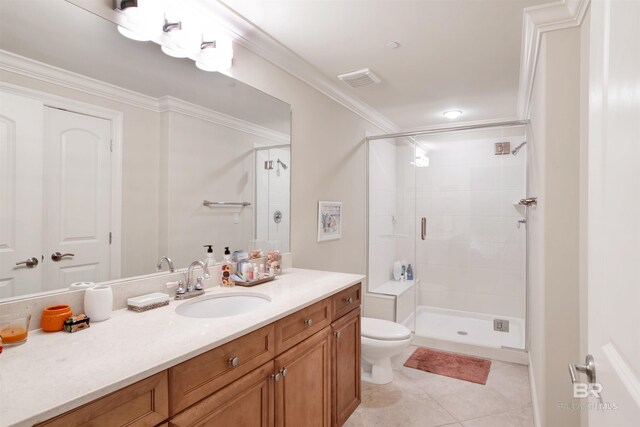 bathroom featuring walk in shower, vanity, toilet, tile patterned floors, and crown molding