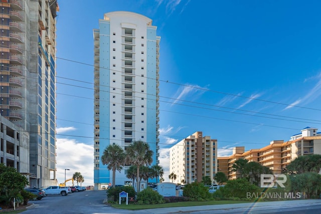 527 E Beach Blvd Unit 603, Gulf Shores, AL 36542 - view of apartment building / complex featuring uncovered parking
