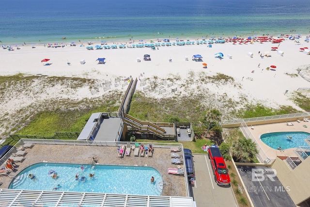 527 E Beach Blvd Unit 603, Gulf Shores, AL 36542 - bird's eye view of a pool and waterfront with a beach