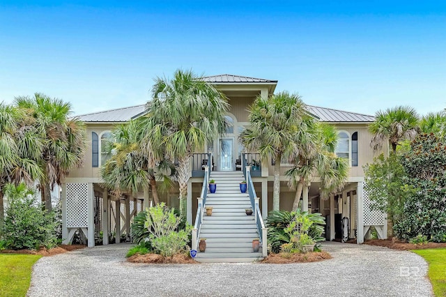 beach home featuring a carport