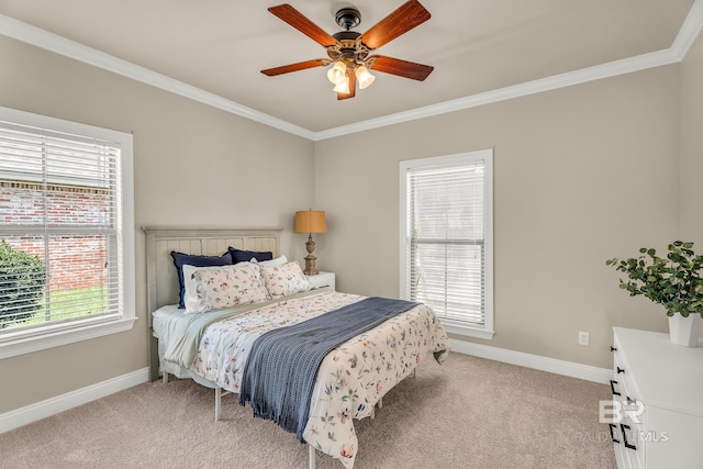 bedroom with ceiling fan, ornamental molding, and light colored carpet