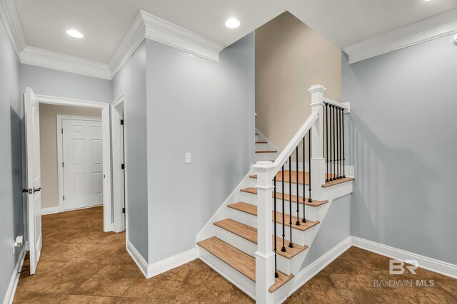 staircase featuring ornamental molding, recessed lighting, and baseboards