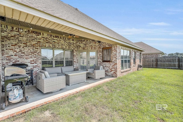 view of patio featuring ceiling fan and outdoor lounge area