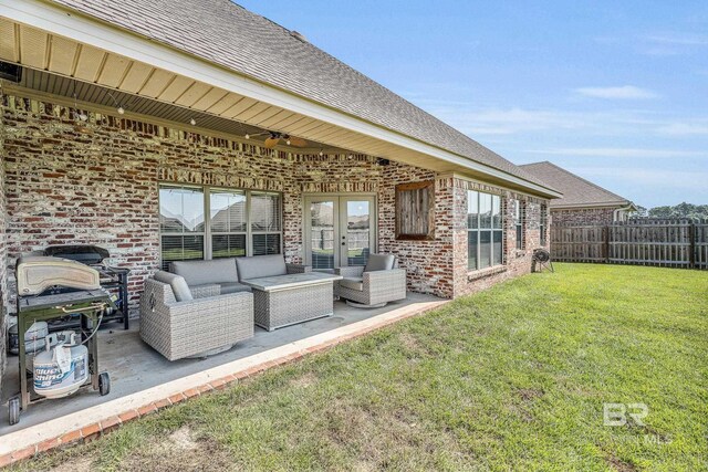 view of patio featuring ceiling fan, outdoor lounge area, fence, a grill, and french doors