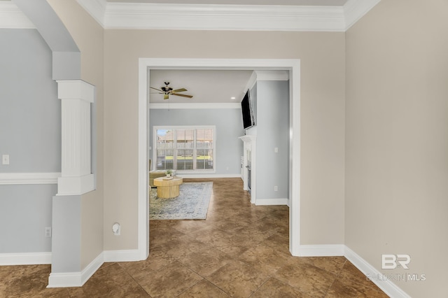 corridor with crown molding and tile patterned floors