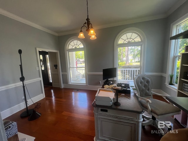 office featuring dark hardwood / wood-style flooring, crown molding, and an inviting chandelier