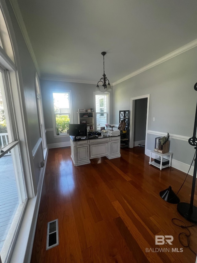 interior space featuring ornamental molding, dark hardwood / wood-style flooring, white cabinetry, and decorative light fixtures