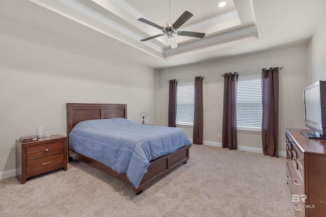 2345 Laurel St, Semmes, AL 36575 - bedroom featuring a tray ceiling, light carpet, crown molding, ceiling fan, and recessed lighting