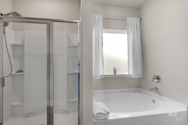 2345 Laurel St, Semmes, AL 36575 - full bathroom with a shower stall and a garden tub