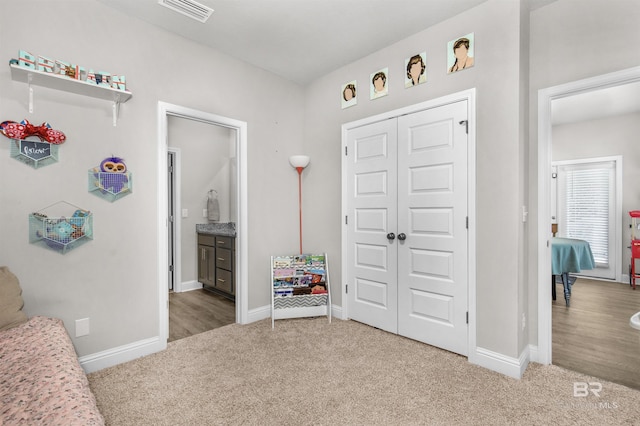 2345 Laurel St, Semmes, AL 36575 - carpeted bedroom with a closet and ensuite bathroom