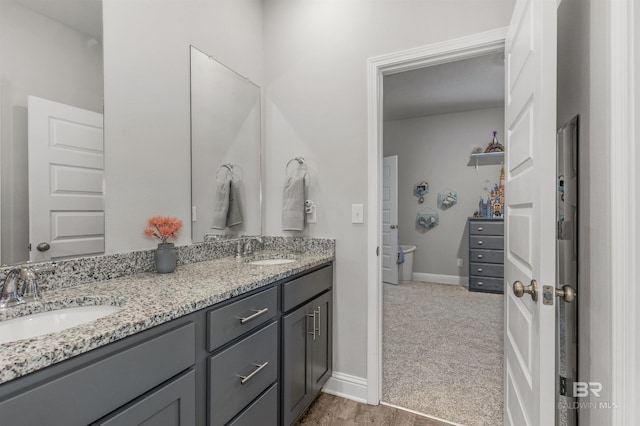 2345 Laurel St, Semmes, AL 36575 - bathroom featuring double vanity and baseboards