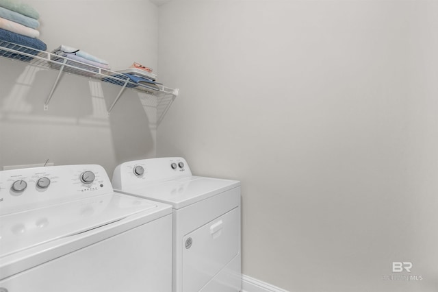 2345 Laurel St, Semmes, AL 36575 - laundry room featuring washer and clothes dryer and baseboards