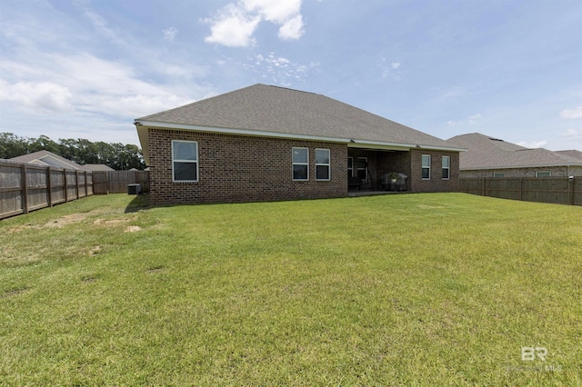 2345 Laurel St, Semmes, AL 36575 - rear view of property with a fenced backyard and brick siding