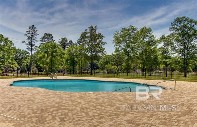 2345 Laurel St, Semmes, AL 36575 - community pool with view of scattered trees and a patio area