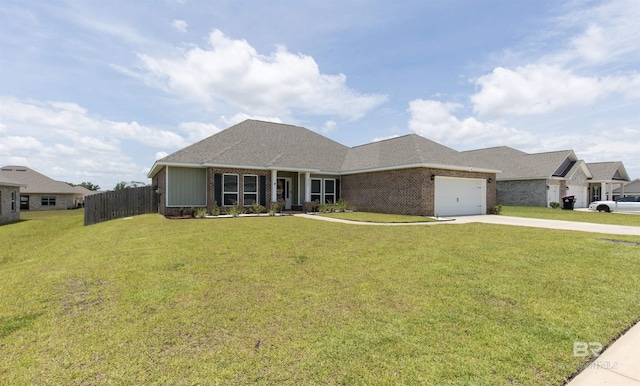 2345 Laurel St, Semmes, AL 36575 - view of front of property featuring driveway, an attached garage, and brick siding